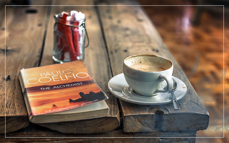 Coffee and book the alchemist